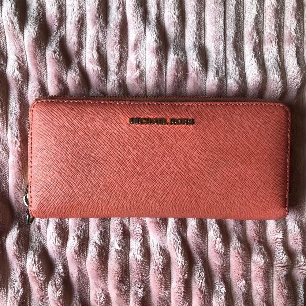 Michael Kors coral/peach wristlet wallet